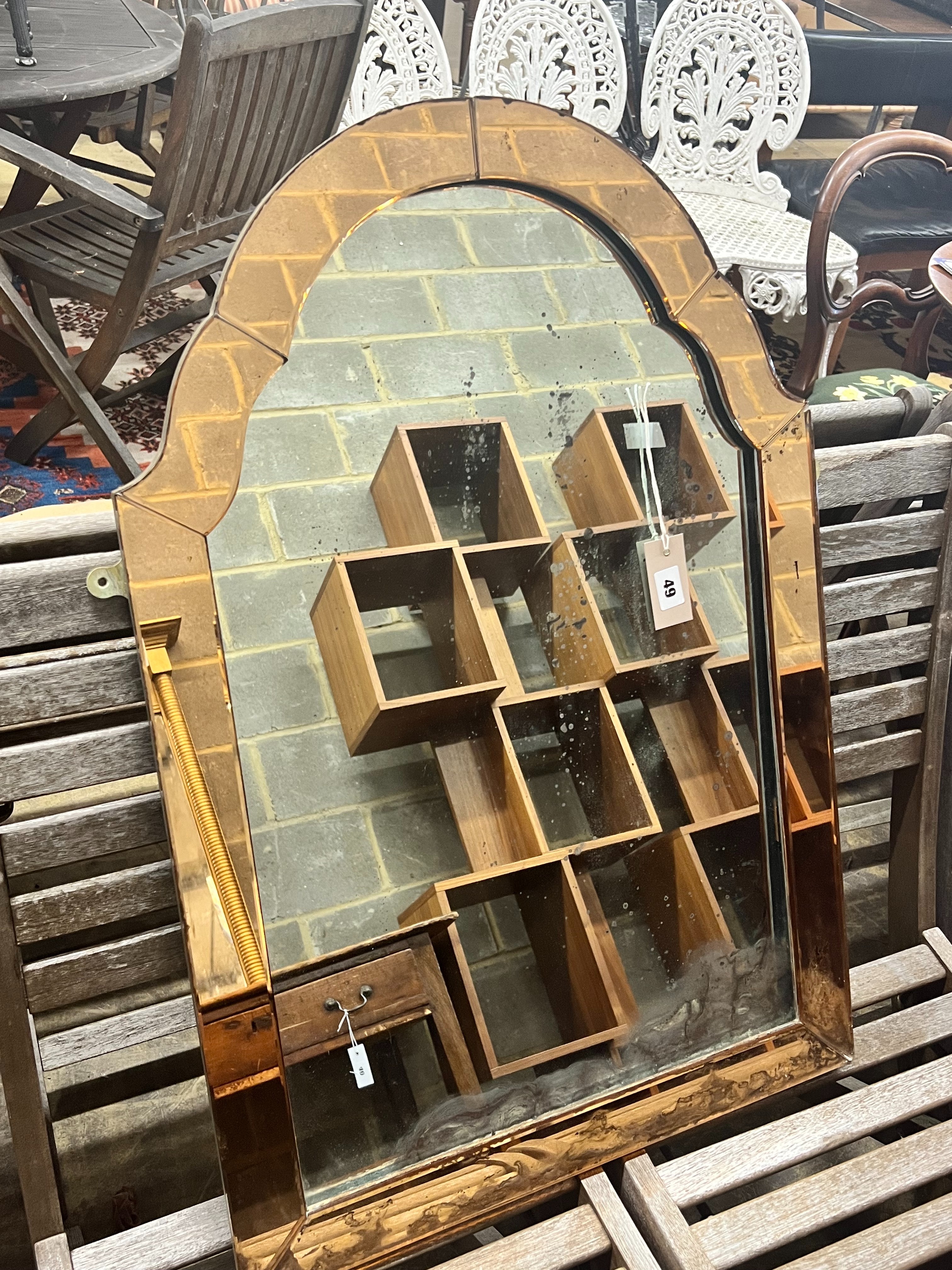 An Art Deco style peach and clear glass wall mirror, width 55cm height 80cm
